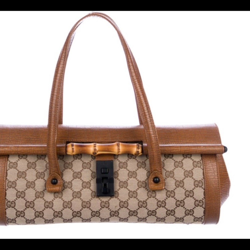 Brown and tan GG canvas Gucci Bullet bag.